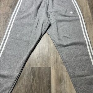 Adidas men’s Gray Joggers with White Stripes